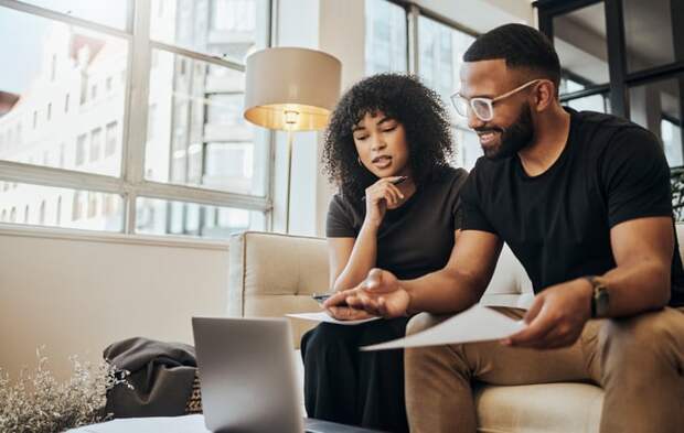 Young couple reviewing their finances.