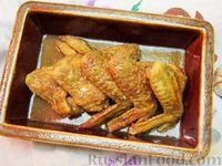 Фото к рецепту: Куриные крылышки с чесноком и карри, запечённые в пиве