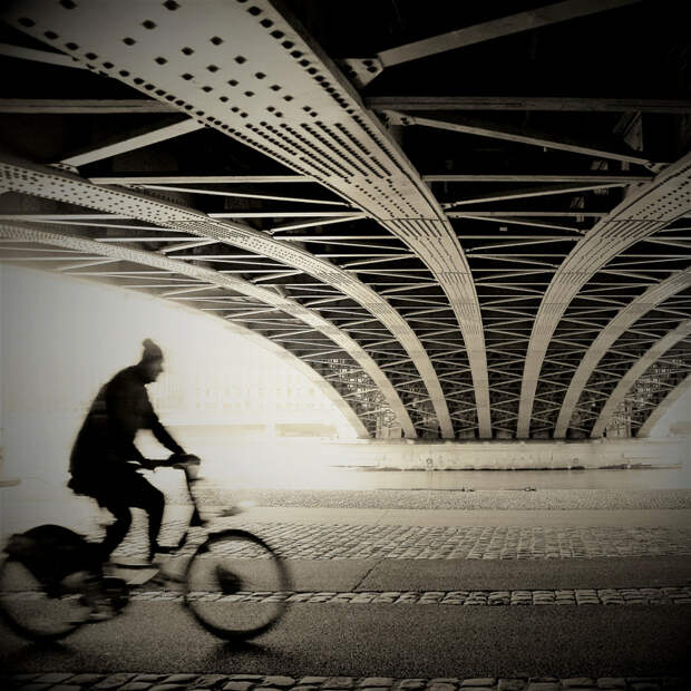 distorted cyclist under the bridge by abracadabra15 on 500px.com