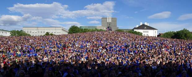 Fans of Iceland watch the Euro 2016 match between Iceland and France in France, at a public screening of the match in Reykjavik, Iceland, July 3, 2016. REUTERS/Geirix - RTX2JJBE