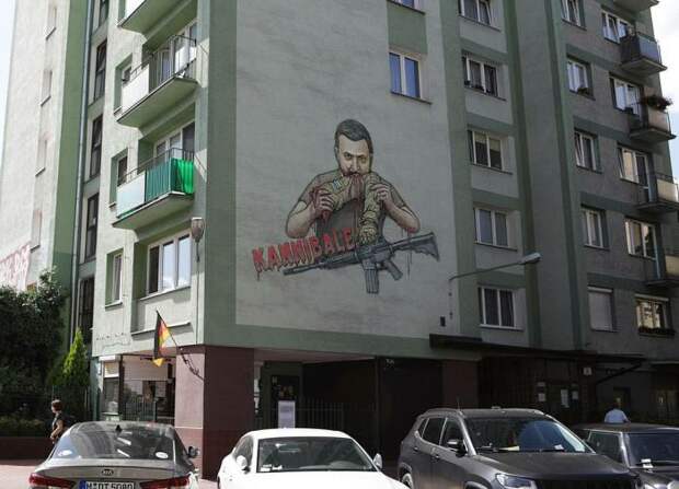 В Берлине ищут художника, который нарисовал на стене дома Зеленского, пожирающего солдат ВСУ