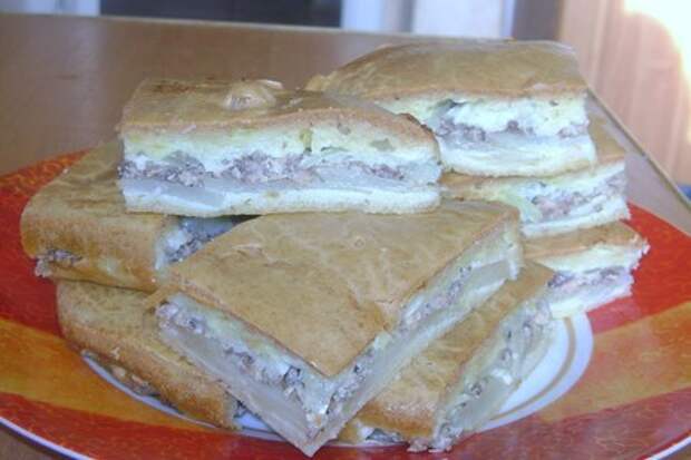Фото к рецепту: Вкусный пирог с сайрой