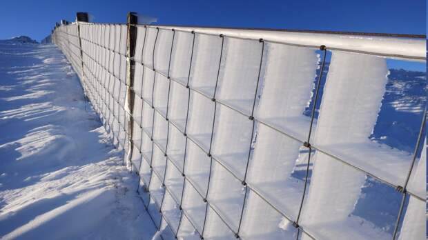 Ice driven through a fence