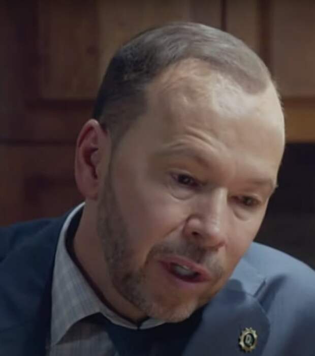 Close-up of Danny defending himself from accusations on Blue Bloods Season 14 Episode 14