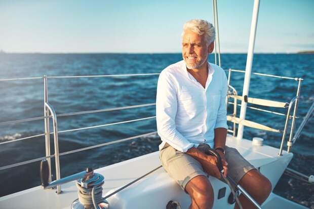 A smiling person on a boat.