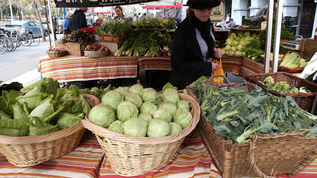 A customer shops for produce at the Ferry Plaza Farmers Market in San Francisco in March. A customer shops for produce at the Ferry Plaza Farmers Market in San Francisco in March.