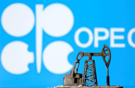Фигурка нефтедобывающей установки на фоне логотипа ОПЕК, 14 апреля 2020 года. REUTERS/Dado Ruvic/Illustration Фигурка нефтедобывающей установки на фоне логотипа ОПЕК, 14 апреля 2020 года. REUTERS/Dado Ruvic/Illustration
