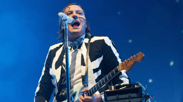 Win Butler of Arcade Fire performs at Chicago's United Center 