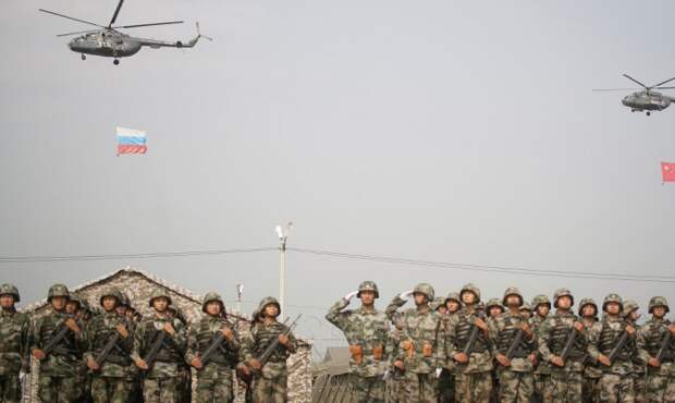 Российские военные прибыли на учения "Мирная миссия 2014" в КНР Российские военные прибыли на учения "Мирная миссия 2014" в КНР